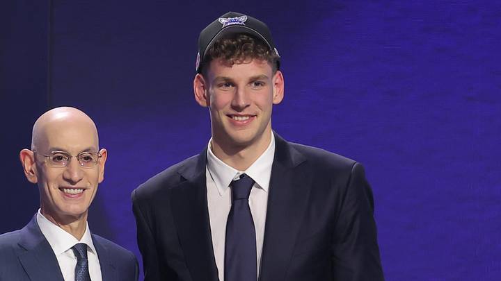 Jun 23, 2026; New York, NY, USA; NBA commissioner Adam Silver greets the fourteenth pick in the 2026 NBA draft, Washington forward Hannes Steinbach after he was selected by the Charlotte Hornets at Barclays Center. Mandatory Credit: Brad Penner-Imagn Images