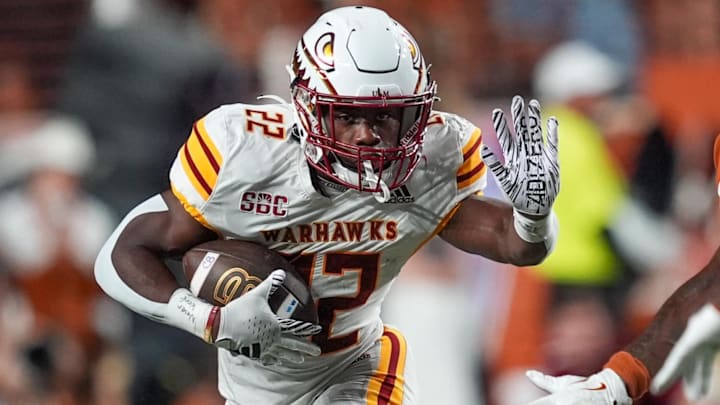 Sep 21, 2024; Austin, Texas, USA;  Louisiana Monroe Warhawks running back Ahmad Hardy (22) runs the ball in the first half against the Texas Longhorns at Darrell K Royal-Texas Memorial Stadium. Mandatory Credit: Daniel Dunn-Imagn Images