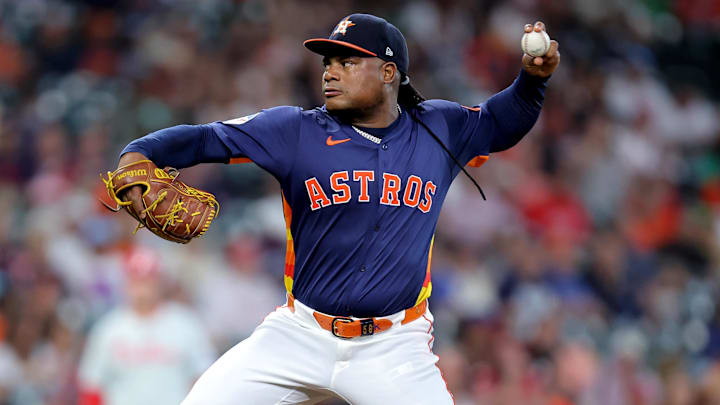 Jun 24, 2025; Houston, Texas, USA; Houston Astros starting pitcher Framber Valdez (59) delivers a pitch against the Philadelphia Phillies during the first inning at Daikin Park.