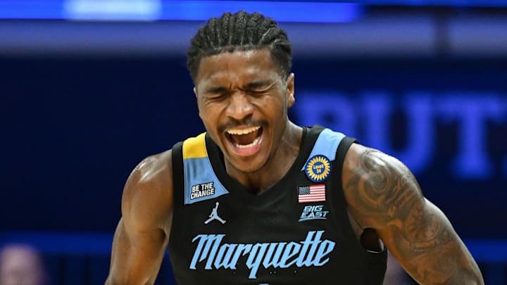 Jan 28, 2025; Indianapolis, Indiana, USA; Marquette Golden Eagles guard Kam Jones (1) celebrates after defeating the Butler Bulldogs at Hinkle Fieldhouse. Mandatory Credit: Robert Goddin-Imagn Images