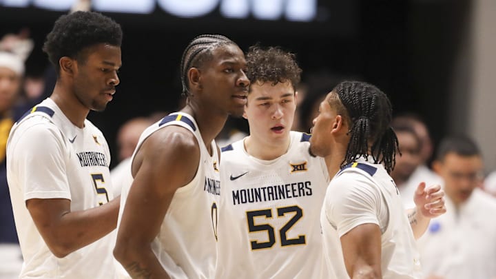 Feb 18, 2026; Morgantown, West Virginia, USA; West Virginia Mountaineers players celebrate after a defensive play during the first half against the Utah Utes at Hope Coliseum. Mandatory Credit: Ben Queen-Imagn Images Feb 18, 2026; Morgantown, West Virginia, USA; West Virginia Mountaineers players celebrate after a defensive play during the first half against the Utah Utes at Hope Coliseum. Mandatory Credit: Ben Queen-Imagn Images