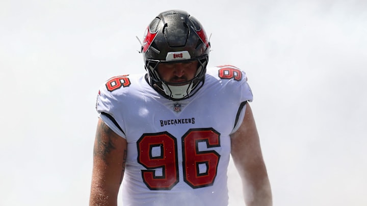 Sep 22, 2024; Tampa, Florida, USA; Tampa Bay Buccaneers defensive tackle Greg Gaines (96) is introduced before a game against the Denver Broncos at Raymond James Stadium. Mandatory Credit: Nathan Ray Seebeck-Imagn Images