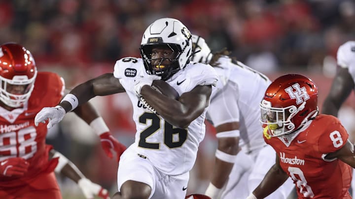 Sep 12, 2025; Houston, Texas, USA; Colorado Buffaloes running back Simeon Price (26) runs with the ball and scores a touchdown during the second quarter against the Houston Cougars at TDECU Stadium. Mandatory Credit: Troy Taormina-Imagn Images