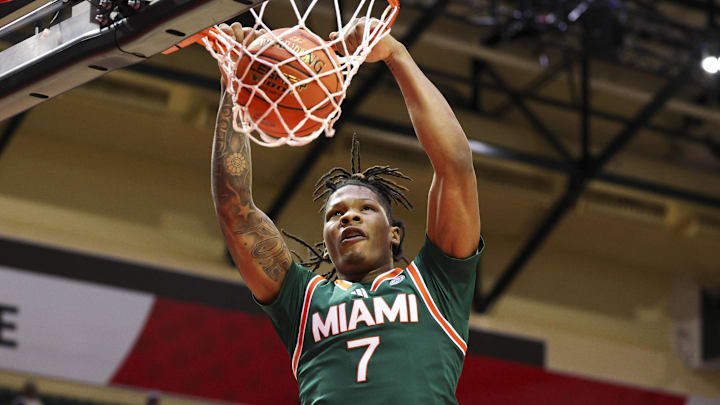 Nov 28, 2025; Kissimmee, FL, USA; Miami (FL) Hurricanes forward Shelton Henderson (7) dunks the ball against the Georgetown Hoyas in the second half during the ESPN Events Invitational at State Farm Field House. Mandatory Credit: Nathan Ray Seebeck-Imagn Images