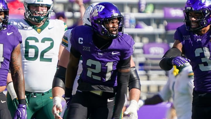 Oct 18, 2025; Fort Worth, Texas, USA; TCU Horned Frogs safety Bud Clark (21) reacts after sacking Baylor Bears quarterback Sawyer Robertson (13) during the second half of a game at Amon G. Carter Stadium. Mandatory Credit: Raymond Carlin III-Imagn Images