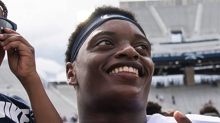 Penn State freshman Ta'Mere Robinson poses for a photo with a young fan following the Blue-White game at Beaver Stadium on Saturday, April 15, 2023, in State College. Penn State freshman Ta'Mere Robinson poses for a photo with a young fan following the Blue-White game at Beaver Stadium on Saturday, April 15, 2023, in State College.