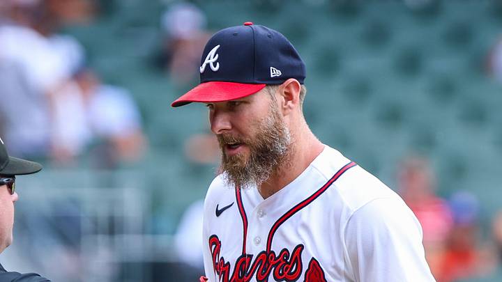 Jul 23, 2026; Cumberland, Georgia, USA; Atlanta Braves pitcher Chris Sale (51) gets his gloved checked by umpire Mike Muchlinski (76) during the game against the San Diego Padres during the first inning at Truist Park. Mandatory Credit: Jordan Godfree-Imagn Images