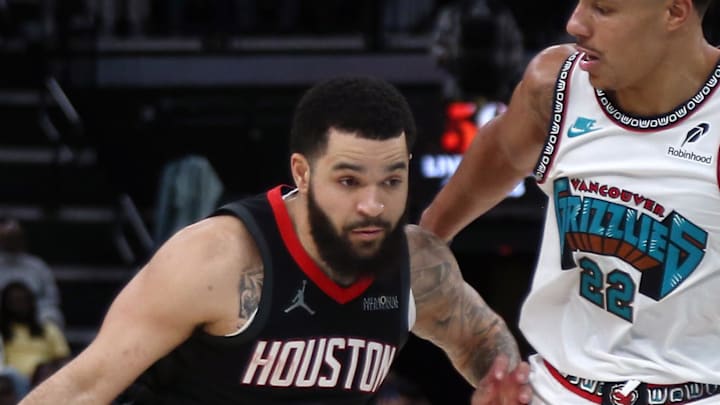 Jan 30, 2025; Memphis, Tennessee, USA; Houston Rockets guard Fred VanVleet (5) drives to the basket as Memphis Grizzlies guard Desmond Bane (22) defends during the third quarter at FedExForum. Mandatory Credit: Petre Thomas-Imagn Images