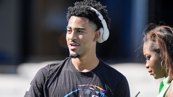 Oct 13, 2024; Charlotte, North Carolina, USA;  Carolina Panthers quarterback Bryce Young (9) gives and interview during pregame warm ups against the Atlanta Falcons at Bank of America Stadium. Mandatory Credit: Jim Dedmon-Imagn Images