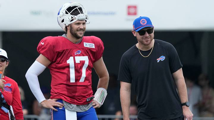 Bills QB Josh Allen talks with head coach Joe Brady during the final day of Buffalo Bills training camp at St. John Fisher. Bills QB Josh Allen talks with head coach Joe Brady during the final day of Buffalo Bills training camp at St. John Fisher.