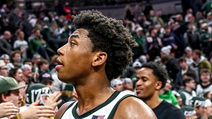 Michigan State's Jeremy Fears Jr. slaps hands with fans after the Spartans overtime win over Illinois on Saturday, Feb. 7, 2026, at the Breslin Center in East Lansing.