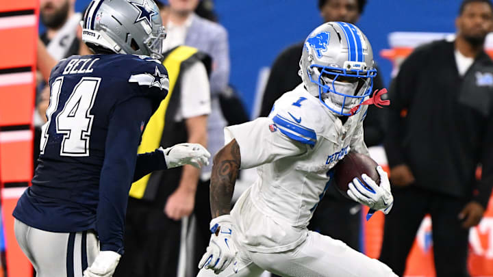 Detroit Lions wide receiver Jameson Williams (1) runs against Dallas Cowboys safety Markquese Bell (14) Detroit Lions wide receiver Jameson Williams (1) runs against Dallas Cowboys safety Markquese Bell (14)