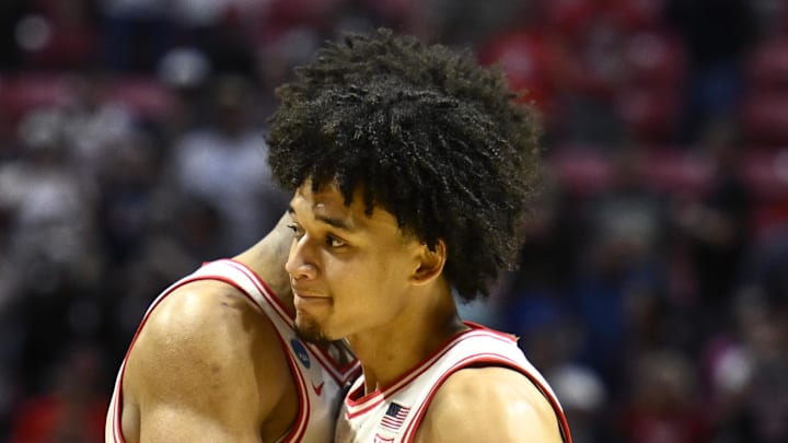 Mar 22, 2026; San Diego, CA, USA; Arizona Wildcats guard Brayden Burries (5) celebrates with forward Koa Peat (10) after defeating the Utah State Aggies during a second round game of the men's 2026 NCAA Tournament at Viejas Arena. Mandatory Credit: Denis Poroy-Imagn Images
