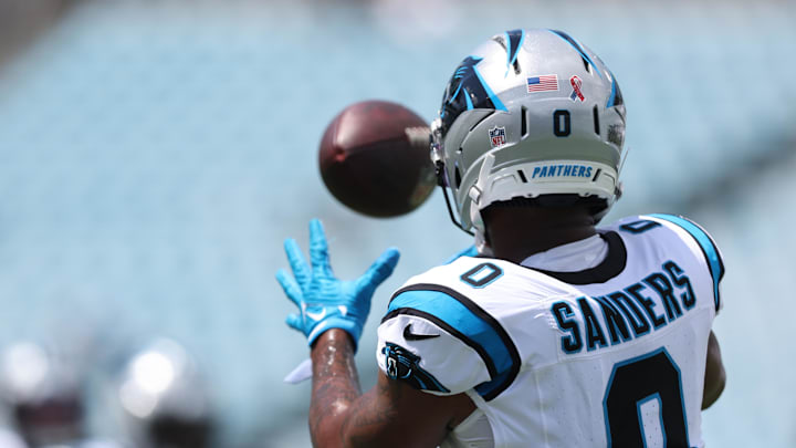Carolina Panthers tight end Ja'Tavion Sanders (0) warms up before a game 