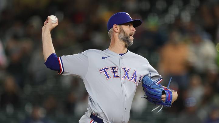 Texas Rangers pitcher Chris Martin delivers a pitch during a game.