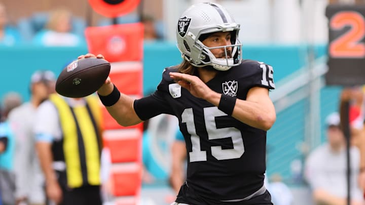 Nov 17, 2024; Miami Gardens, Florida, USA; Las Vegas Raiders quarterback Gardner Minshew (15) throws the football against the Miami Dolphins during the third quarter at Hard Rock Stadium. Mandatory Credit: Sam Navarro-Imagn Images