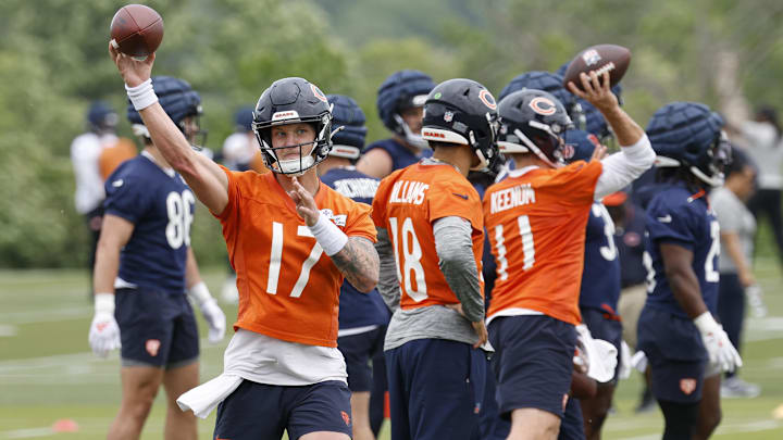 Chicago Bears quarterbacks Tyson Bagent, Caleb Williams and Case Keenum get in throws during warmups at minicamp.