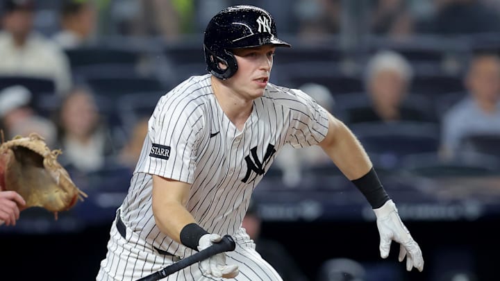 Sep 25, 2025; Bronx, New York, USA; New York Yankees first baseman Ben Rice (22) follows through on an RBI ground out against the Chicago White Sox during the first inning at Yankee Stadium. Mandatory Credit: Brad Penner-Imagn Images
