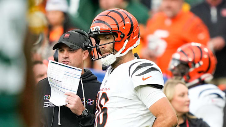 Oct 12, 2025; Green Bay, Wisconsin, USA; Cincinnati Bengals head coach Zac Taylor speaks with quarterback Joe Flacco (16) during the third quarter against the Green Bay Packers at Lambeau Field. Mandatory Credit: Kayla Wolf-Imagn Images Oct 12, 2025; Green Bay, Wisconsin, USA; Cincinnati Bengals head coach Zac Taylor speaks with quarterback Joe Flacco (16) during the third quarter against the Green Bay Packers at Lambeau Field. Mandatory Credit: Kayla Wolf-Imagn Images