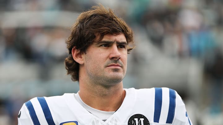 Indianapolis Colts quarterback Daniel Jones stands on the field Indianapolis Colts quarterback Daniel Jones stands on the field