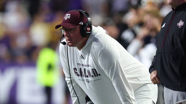 Texas A&M Aggies head coach Mike Elko during the first half against the Louisiana State Tigers at Tiger Stadium. Texas A&M Aggies head coach Mike Elko during the first half against the Louisiana State Tigers at Tiger Stadium.