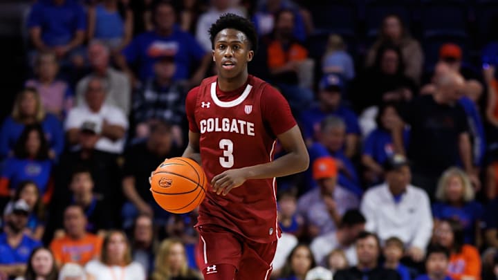 Dec 21, 2025; Gainesville, Florida, USA; Colgate Raiders guard Jalen Cox (3) dribbles the ball against the Florida Gators during the first half at Exactech Arena at the Stephen C. O'Connell Center. Mandatory Credit: Matt Pendleton-Imagn Images