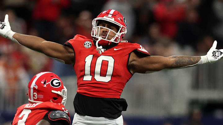 Dec 7, 2024; Atlanta, GA, USA; Georgia Bulldogs linebacker Damon Wilson II (10), linebacker Jalon Walker (11) and linebacker CJ Allen (3) react during the second half in the 2024 SEC Championship game at Mercedes-Benz Stadium. Mandatory Credit: Brett Davis-Imagn Images