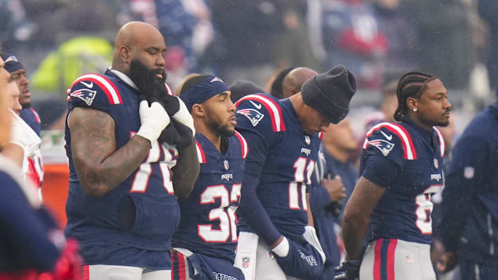 Jan 18, 2026; Foxborough, MA, USA; New England Patriots offensive tackle Morgan Moses (76) looks on during the national anthem before an AFC Divisional Round game against the Houston Texans at Gillette Stadium. Mandatory Credit: David Butler II-Imagn Images