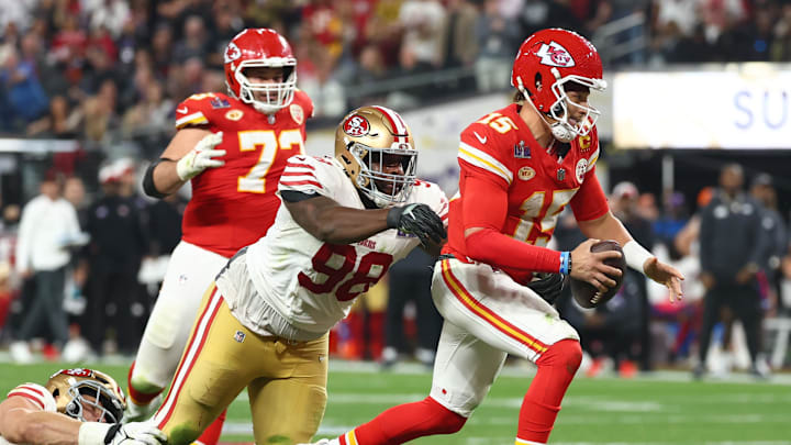 Feb 11, 2024; Paradise, Nevada, USA; Kansas City Chiefs quarterback Patrick Mahomes (15) is pressured by San Francisco 49ers defensive tackle Javon Hargrave (98) in the fourth quarter in Super Bowl LVIII at Allegiant Stadium. Mandatory Credit: Mark J. Rebilas-Imagn Images