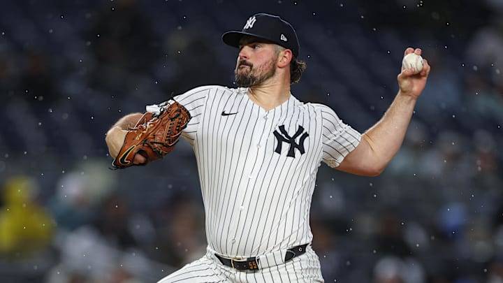 Apr 2, 2025; Bronx, New York, USA; New York Yankees starting pitcher Carlos Rodon (55) delivers a pitch during the first inning against the Arizona Diamondbacks at Yankee Stadium. 