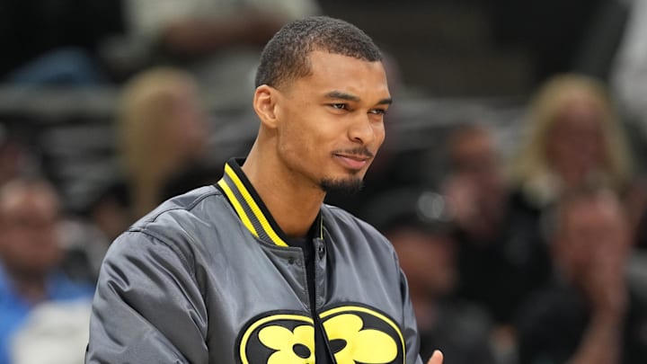 Apr 8, 2026; San Antonio, Texas, USA; San Antonio Spurs forward Victor Wembanyama (1) cheers his teammates from the bench during the first half against the Portland Trail Blazers at Frost Bank Center. Mandatory Credit: Scott Wachter-Imagn Images