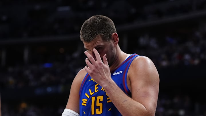 May 9, 2025; Denver, Colorado, USA; Denver Nuggets center Nikola Jokic (15) reacts after a shooting foul is called in the second quarter against the Oklahoma City Thunder during game three of the second round for the 2025 NBA Playoffs at Ball Arena. Mandatory Credit: Ron Chenoy-Imagn Images