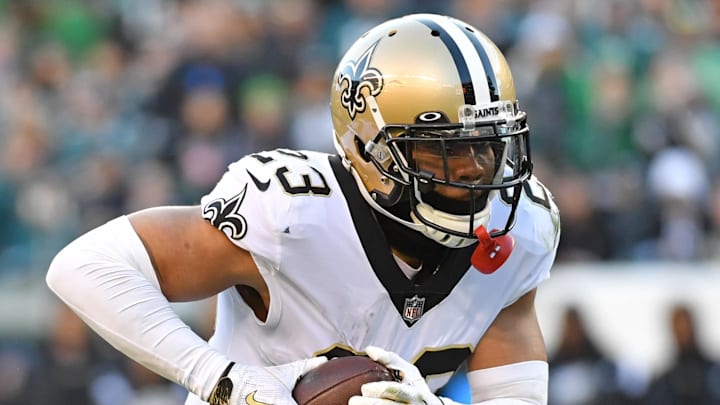 Jan 1, 2023; Philadelphia, Pennsylvania, USA; New Orleans Saints cornerback Marshon Lattimore (23) runs with the football after intercepting a pass against the Philadelphia Eagles at Lincoln Financial Field. Mandatory Credit: Eric Hartline-Imagn Images