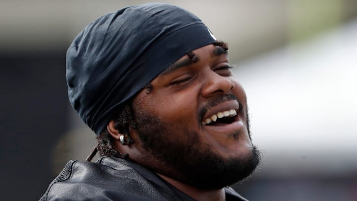 Purdue Boilermakers offensive lineman Jalen Grant (75) smiles Thursday, Aug. 8, 2024, during Purdue football practice at Bimel Outdoor Practice Complex in West Lafayette, Ind.
