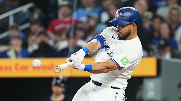May 3, 2025; Toronto, Ontario, CAN; Toronto Blue Jays designated hitter Anthony Santander (25) hits a single against the Cleveland Guardians during the first inning at Rogers Centre. May 3, 2025; Toronto, Ontario, CAN; Toronto Blue Jays designated hitter Anthony Santander (25) hits a single against the Cleveland Guardians during the first inning at Rogers Centre.