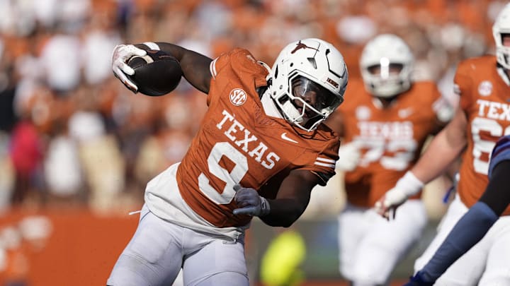 Nov 9, 2024; Austin, Texas, USA; Texas Longhorns running back Jerrick Gibson (9) runs for yards during the second half against the Florida Gators at Darrell K Royal-Texas Memorial Stadium. Mandatory Credit: Scott Wachter-Imagn Images