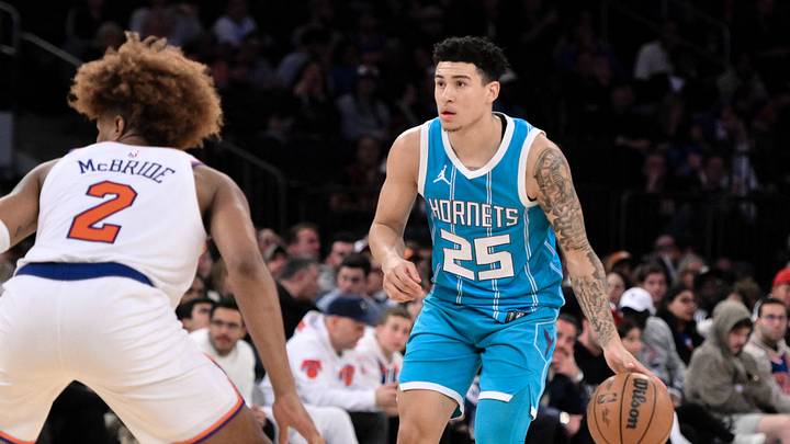 Oct 15, 2024; New York, New York, USA; Charlotte Hornets guard K.J. Simpson (25) sets the play as New York Knicks guard Miles McBride (2) defends during the second half at Madison Square Garden. Mandatory Credit: John Jones-Imagn Images Oct 15, 2024; New York, New York, USA; Charlotte Hornets guard K.J. Simpson (25) sets the play as New York Knicks guard Miles McBride (2) defends during the second half at Madison Square Garden. Mandatory Credit: John Jones-Imagn Images