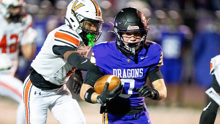 Johnston's Bryce Beachem (0) breaks away for a gain of yards against Valley on Nov. 7, 2025, at Johnston High School. Johnston's Bryce Beachem (0) breaks away for a gain of yards against Valley on Nov. 7, 2025, at Johnston High School.