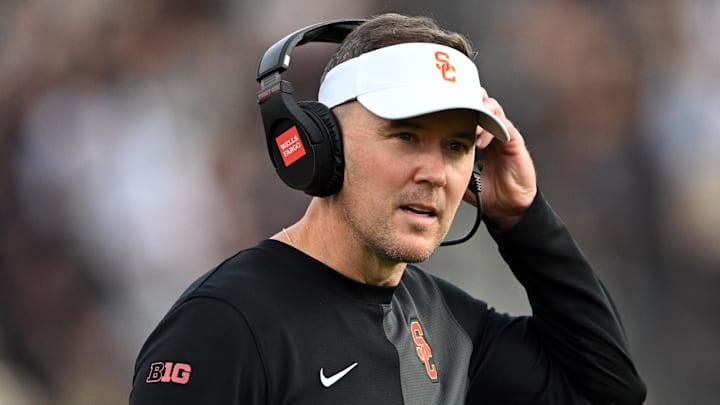 Sep 13, 2025; West Lafayette, Indiana, USA; Southern California Trojans head coach Lincoln Riley stands on the sidelines during the first quarter against the Purdue Boilermakers at Ross-Ade Stadium. Mandatory Credit: Marc Lebryk-Imagn Images