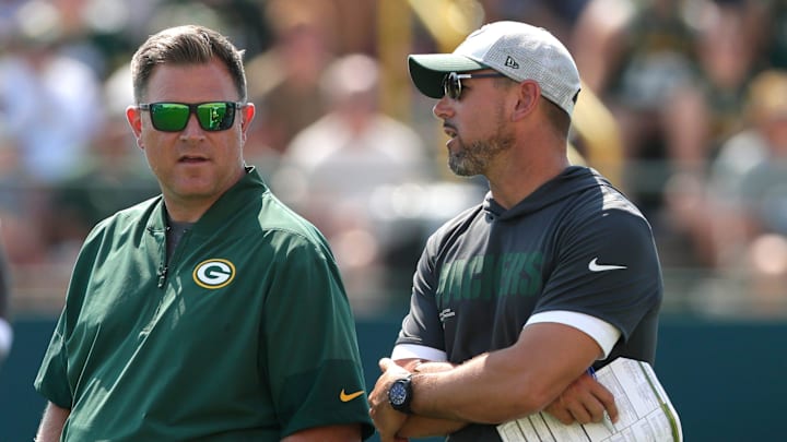 Green Bay Packers General Manager Brian Gutekunst talks with head coach Matt LaFleur during fifth day of training camp on July 28, 2025, at Ray Nitschke Field in Ashwaubenon, Wis.