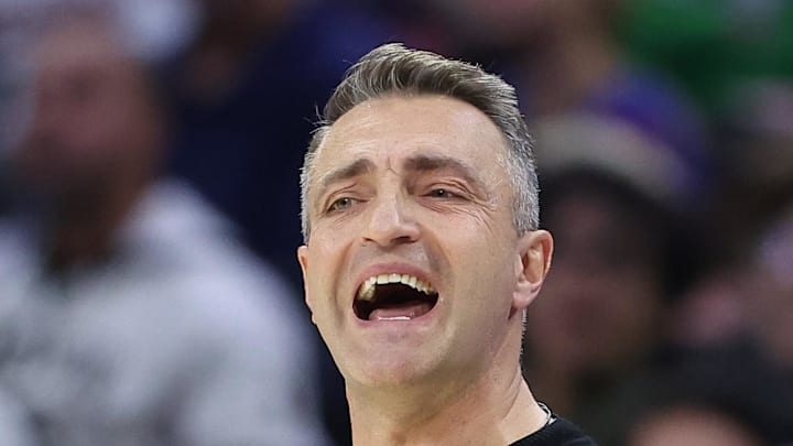 Toronto Raptors head coach Darko Rajakovic reacts to a play against the Philadelphia 76ers.