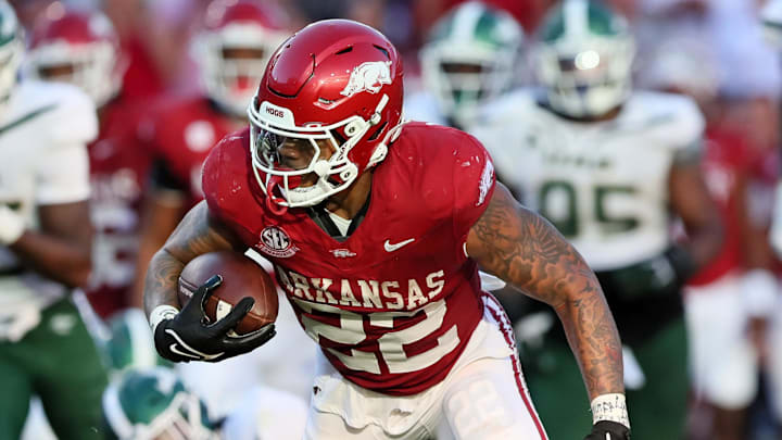 Arkansas Razorbacks running back Ja’Quinden Jackson (22) rushes during the second half against the UAB Blazers at Razorback Stadium.