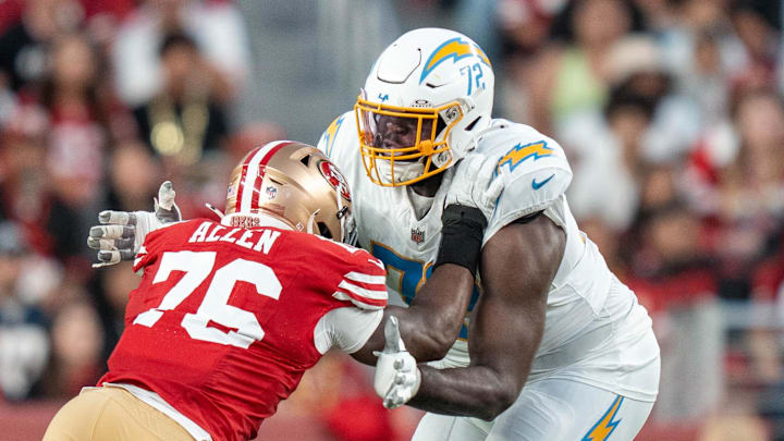 August 23, 2025; Santa Clara, California, USA; Los Angeles Chargers offensive tackle David Sharpe (72) blocks San Francisco 49ers defensive end Jaylon Allen (76) during the third quarter at Levi's Stadium. Mandatory Credit: Kyle Terada-Imagn Images August 23, 2025; Santa Clara, California, USA; Los Angeles Chargers offensive tackle David Sharpe (72) blocks San Francisco 49ers defensive end Jaylon Allen (76) during the third quarter at Levi's Stadium. Mandatory Credit: Kyle Terada-Imagn Images