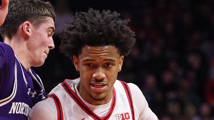 Jan 11, 2026; Piscataway, New Jersey, USA; Rutgers Scarlet Knights guard Tariq Francis (0) drives to the basket against Northwestern Wildcats guard Jake West (3)  during the second half at Jersey Mike's Arena. Mandatory Credit: Vincent Carchietta-Imagn Images
