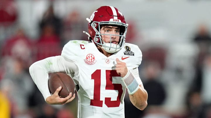 Alabama's Ty Simpson (15) rushes in the second half of the College Football Playoff game between the University of Oklahoma Sooners (OU) and the Alabama Crimson Tide at the Gaylord Family - Oklahoma Memorial Stadium in Norman, Okla., Friday Dec. 19, 2025.