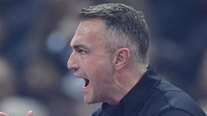 Toronto Raptors head coach Darko Rajakovic reacts in the first quarter against the Cleveland Cavaliers.