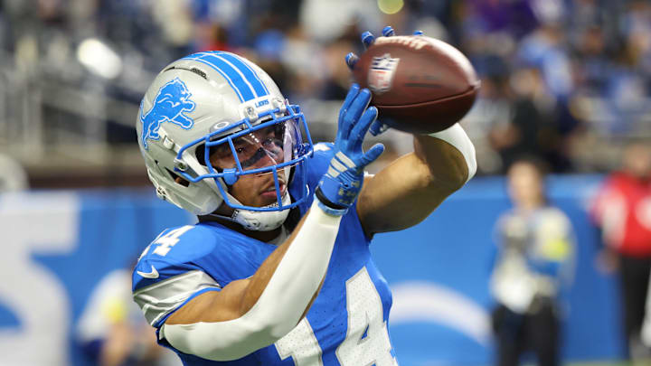 Detroit Lions wide receiver Amon-Ra St. Brown (14) warms up before the game against the Minnesota Vikings