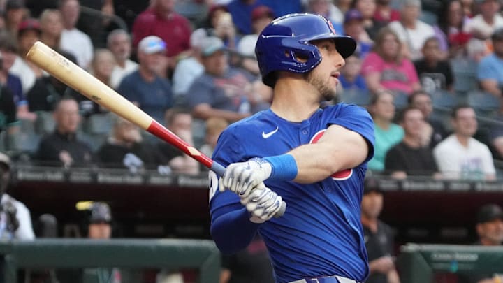 Mar 29, 2025; Phoenix, Arizona, USA; Chicago Cubs outfielder Kyle Tucker (30) hits a double against the Arizona Diamondbacks in the first inning at Chase Field. Mar 29, 2025; Phoenix, Arizona, USA; Chicago Cubs outfielder Kyle Tucker (30) hits a double against the Arizona Diamondbacks in the first inning at Chase Field.