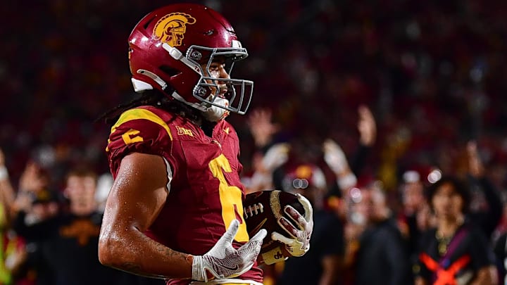 Sep 20, 2025; Los Angeles, California, USA; Southern California Trojans wide receiver Makai Lemon (6) runs for a touchdown against the Michigan State Spartans during the second half at the Los Angeles Memorial Coliseum. Mandatory Credit: Gary A. Vasquez-Imagn Images Sep 20, 2025; Los Angeles, California, USA; Southern California Trojans wide receiver Makai Lemon (6) runs for a touchdown against the Michigan State Spartans during the second half at the Los Angeles Memorial Coliseum. Mandatory Credit: Gary A. Vasquez-Imagn Images