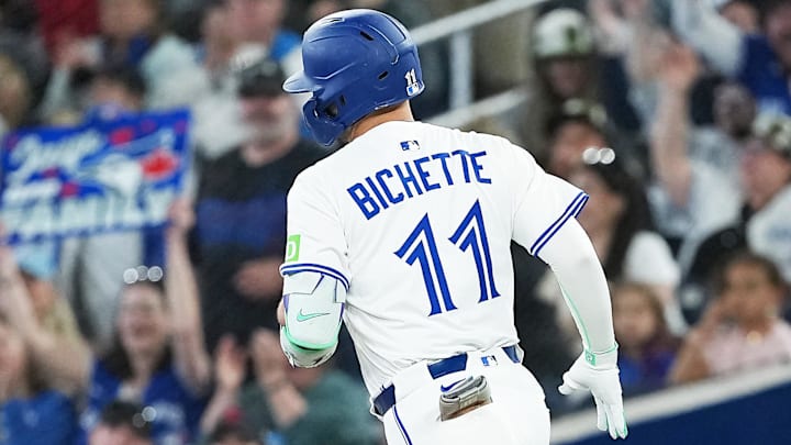 May 3, 2025; Toronto, Ontario, CAN; Toronto Blue Jays shortstop Bo Bichette (11) runs the bases after hitting a home run during the first inning at Rogers Centre